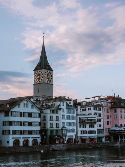 St. Peter’s church tower above the old town on the Limmat in Zürich