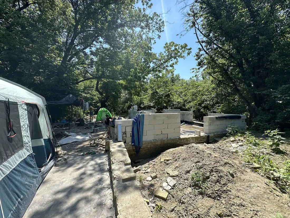 The walls of one of Liberland’s first houses going up beside the camp tents
