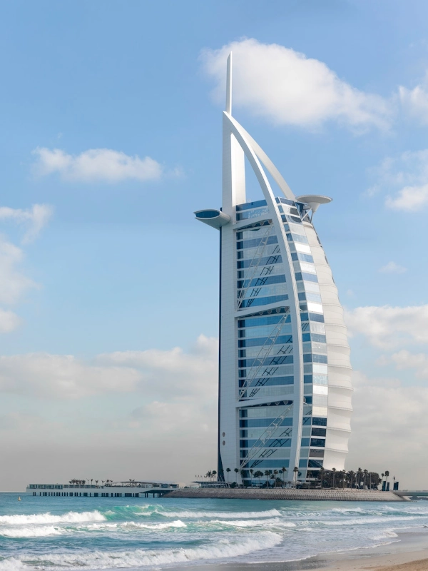 dubai low angle photo of city high rise buildings during daytime