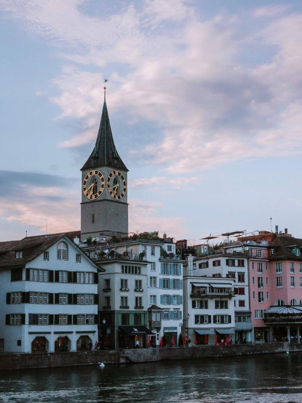zurich low angle photo of city high rise buildings during daytime